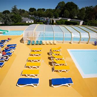 Indoor swimming pool in Campsite de la plage in Benodet