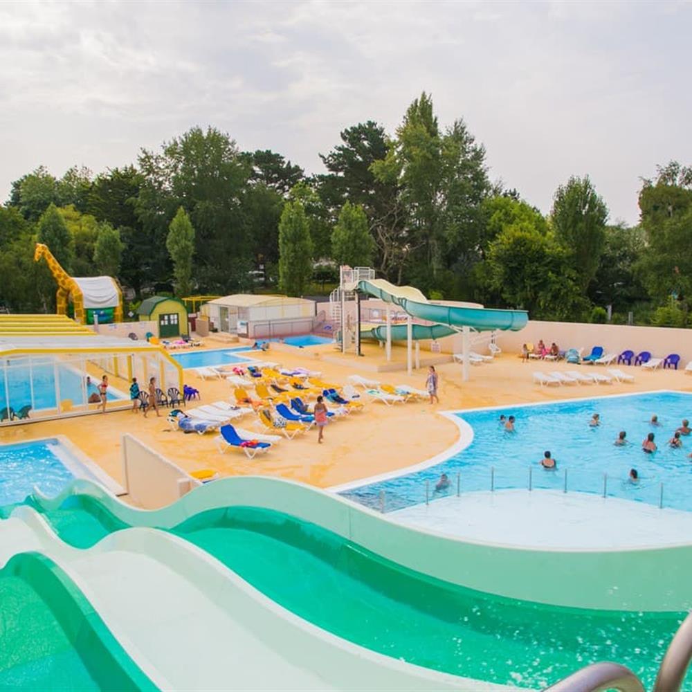 Aquatic area with swimming pools and slides